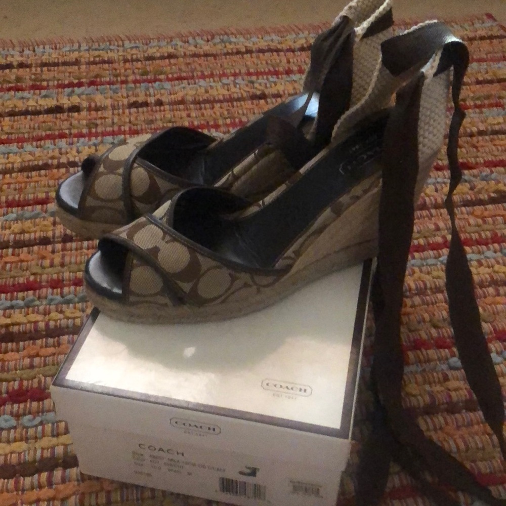 Coach lace up espadrilles. Brown and beige in color.